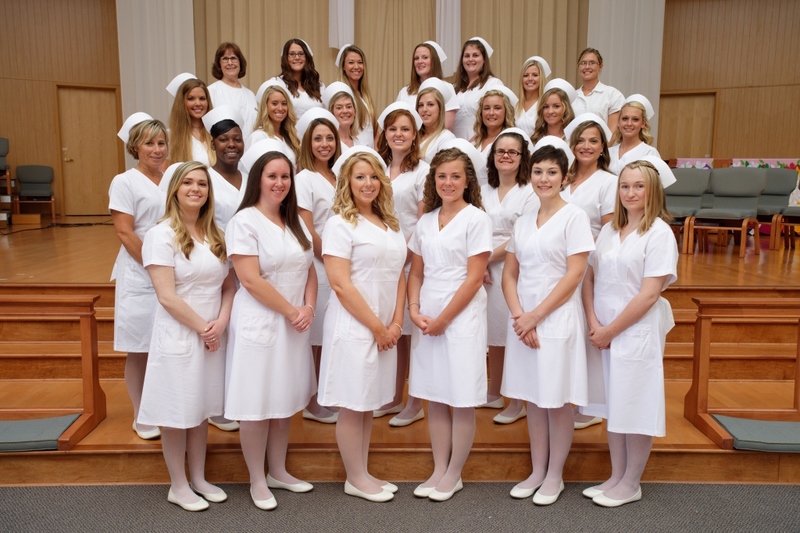 Gathered for the graduation of the class of 2014 of the Margaret H. Rollins School of Nursing at Beebe Healthcare are in back (l-r) class advisor Joy Bartell, MSN, RN, CNE; Jennifer Byler; Whitney Mott-Lynn; Jill Petrone; Jesse Simpson; Alexa Colegrove; and class advisor Nicole Hall, MSN, MBA, RN; third row, Jill Gamble, Chelsey Webb, Candace Conaway, Alyssa Edwards, Jenna Wilgus, Thomasina Roe, and Amber Shetzler; second row, Deborah Demopoulos, Shauntey Singletary, Leah Smith, Danielle LeGates, Meryha Michels, and Katrina Sellers; and in front, Brandi Romano, Ashley Willey, Samantha Halla, Megan Shockley, Sara Lowe and Tatiana Richardson. SOURCE SUBMITTED